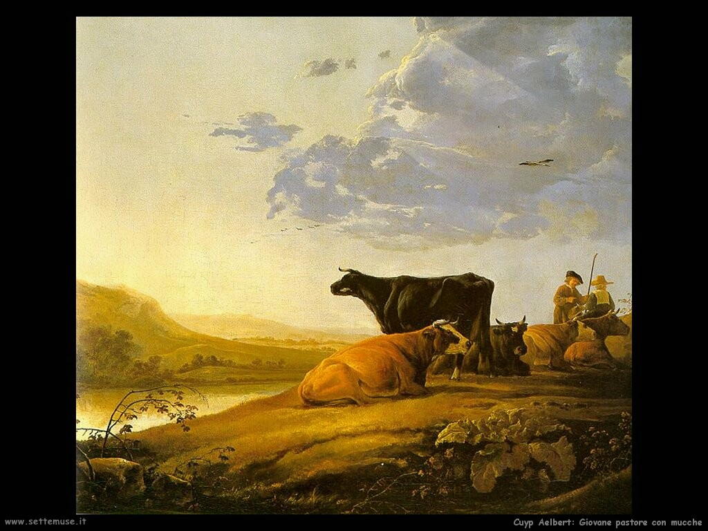 Giovane pastore con mucche